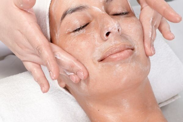 Earth Body & Skin | Deluxe Vegan Mani or Pedi with Gel + Glow Plant Based Facial for 1